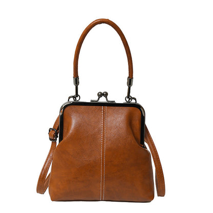 Sac bandoulière femme à fermoir kiss lock avec poignée supérieure